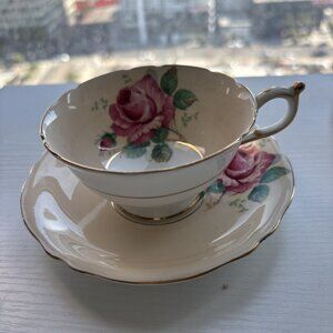 Beautiful Vintage Paragon Pale Yellow and Pink Rose teacup and Saucer